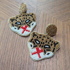 The Tiny Tassel Jaguar Earring